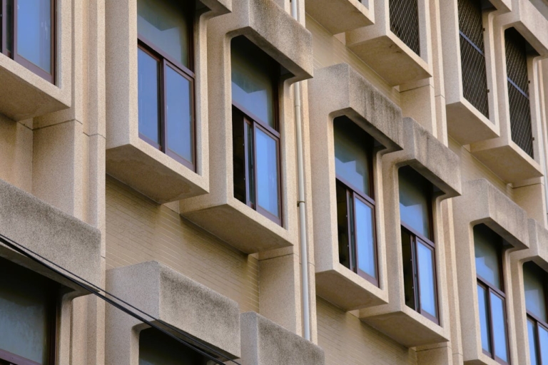 High-rise building exterior for structural defect inspection services.